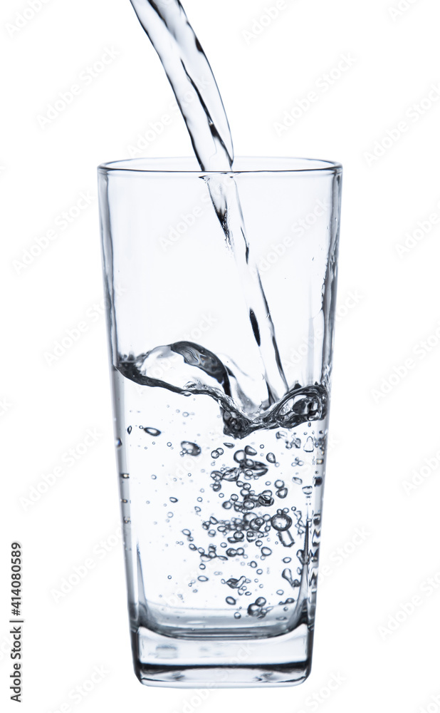 pouring water on a glass on white background clipping path pouring water on a glass on white background clipping path