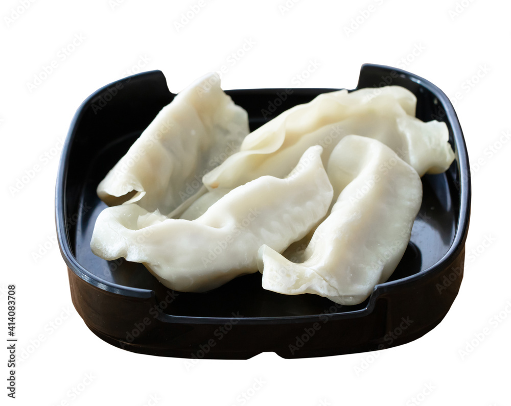 fresh raw Dumpling. sliced on square plate isolated on white background, shabu, hot pot ingredients fresh raw Dumpling. sliced on square plate isolated on white background, shabu, hot pot ingredients