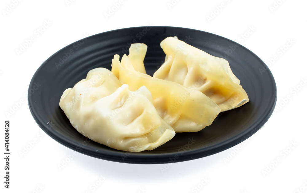fresh raw Dumpling sliced on square plate isolated on white background, shabu, hot pot ingredients fresh raw Dumpling sliced on square plate isolated on white background, shabu, hot pot ingredients