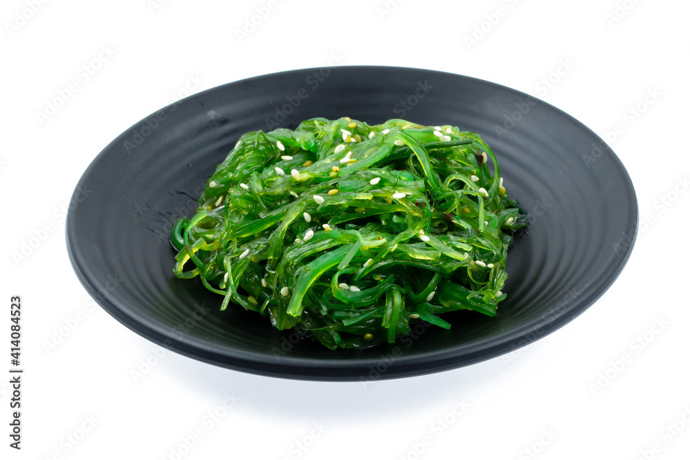 fresh raw seaweed sliced on square plate isolated on white background, shabu, hot pot ingredients fresh raw seaweed sliced on square plate isolated on white background, shabu, hot pot ingredients