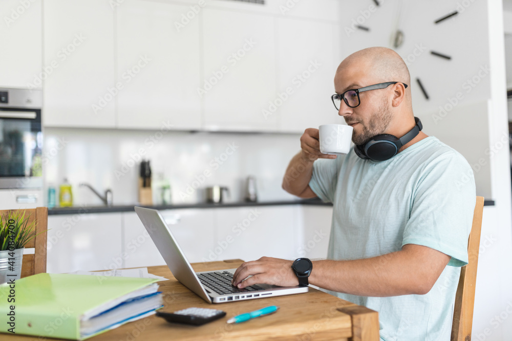 Man working from home during the coronavirus pandemic Man working from home during the coronavirus pandemic