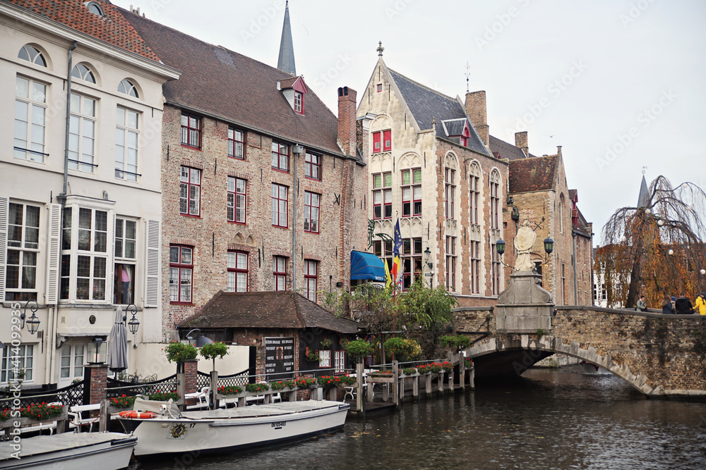 A beautiful view from Bruges with buildings and canals