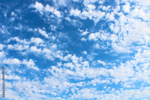 Beautiful blue sky and white cirrus clouds. Background. Texture. Scenery.
