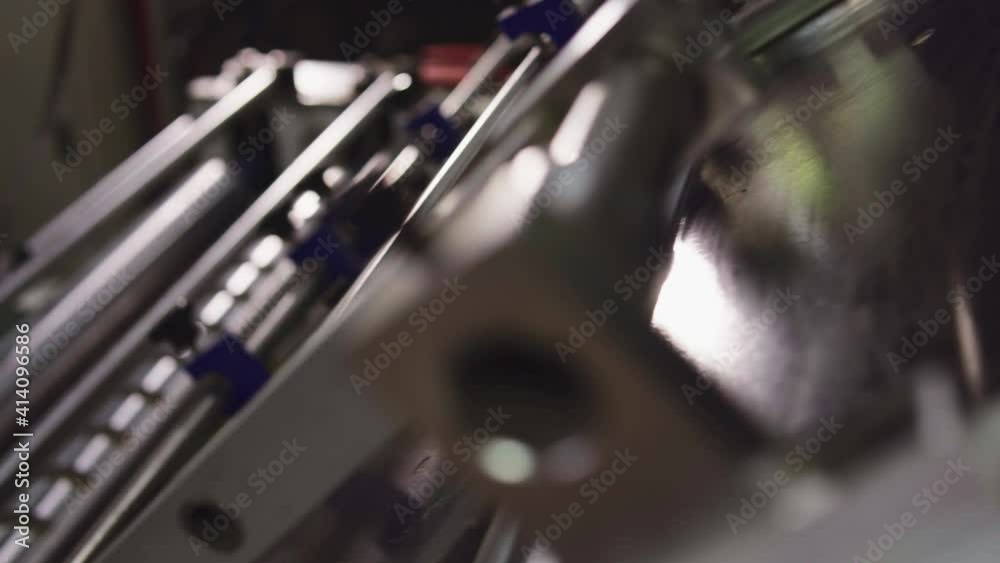 Automatic packaging production line. Bonding of parts. Creation of finished paper products. Packaging and printing. Industrial production