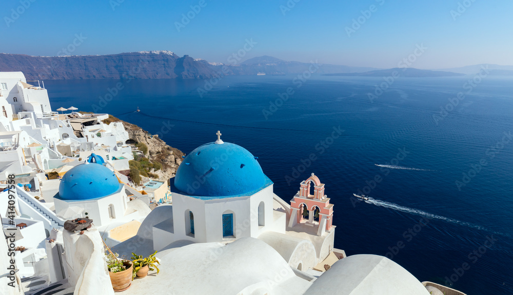 Panoramic view of Oia town cityscape at Santorini island in Greece