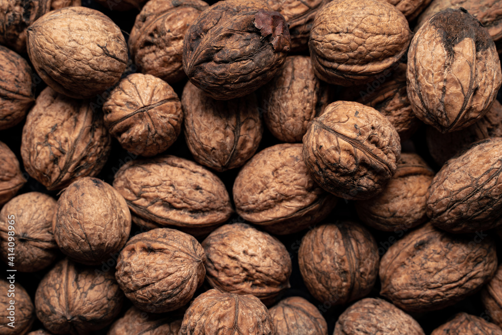 close up of walnuts from above close up of walnuts from above