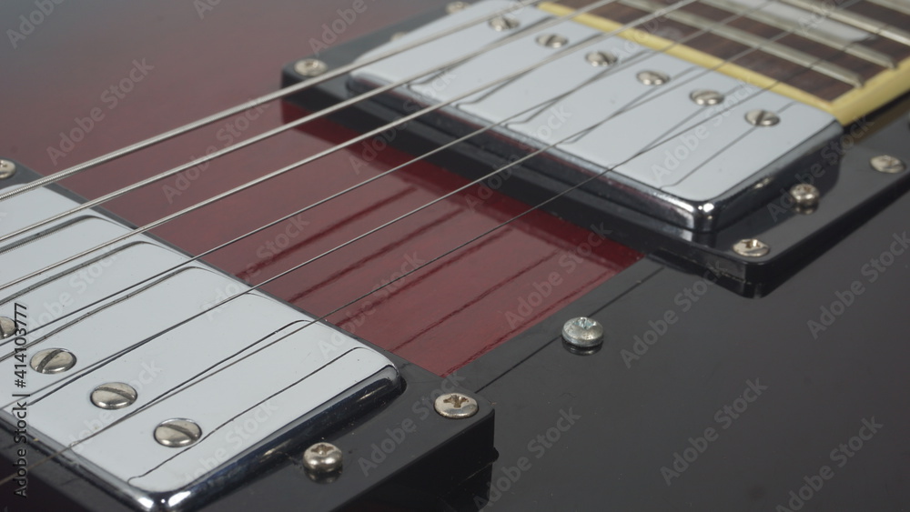 Fototapeta premium Electric guitar body detail, close-up view.