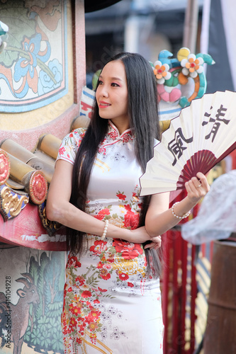 Portrait of asian woman in the chinese dress and Chinese new year concept