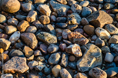 Pebble stones on a beach at Vejle fjord, Denmark