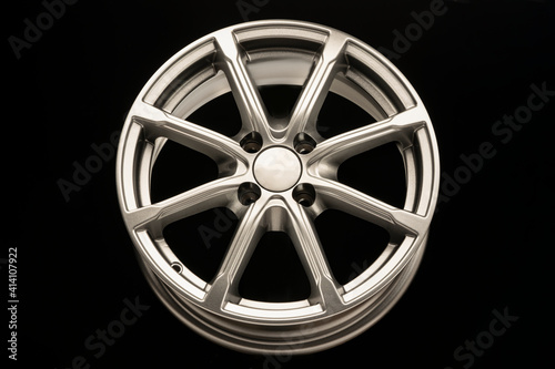 silver new alloy wheel for car, front view