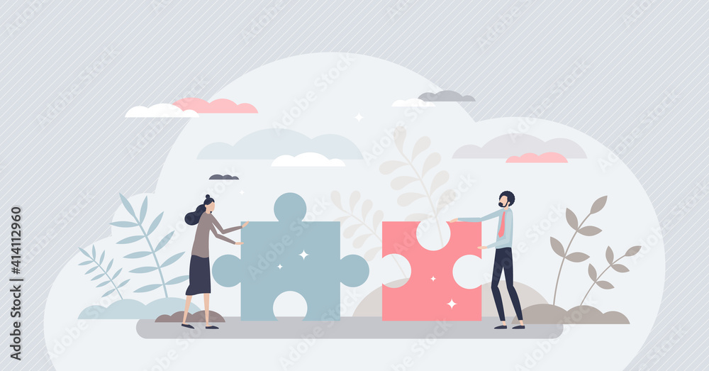 Business partners teamwork with two jigsaw puzzle pieces tiny person concept