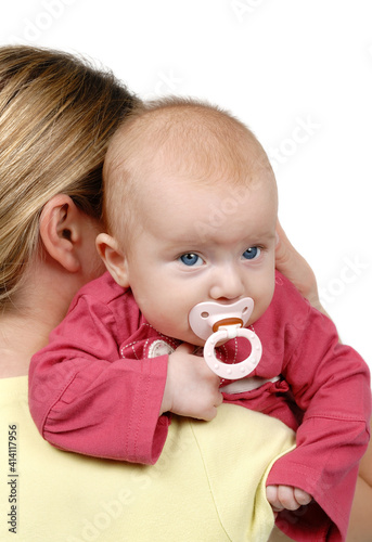 Mother holding baby in her arms