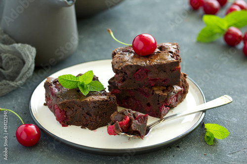 Chocolate brownie cakes with cherry. selective focus.