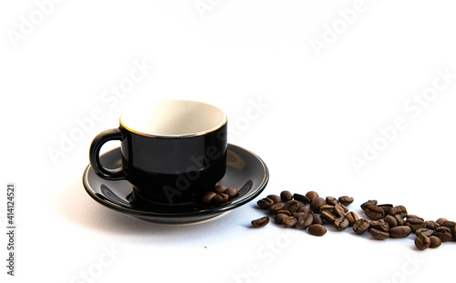 Coffee beans, a coffee cup.