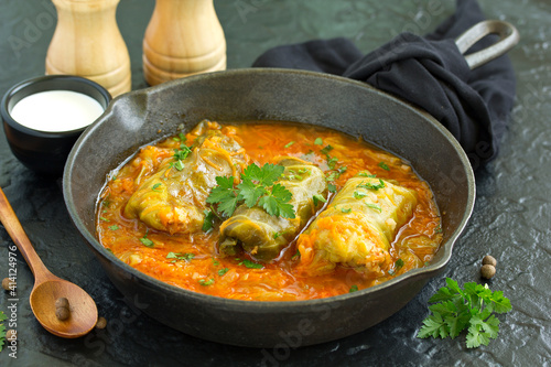 Ukrainian traditional dish with cabbage and stuffed cabbage. Selective focus.
