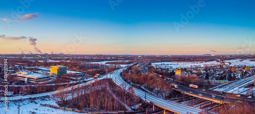View of the snow-covered skyline of Duisburg at sunset from above © Julia Hermann