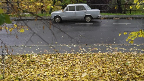 Lada 2101, socialist retro car parking on the street.
