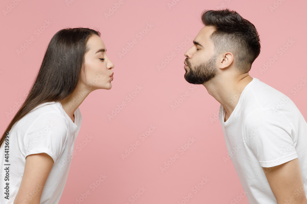 Side profile of a couple looking at each other Stock Photo - Alamy