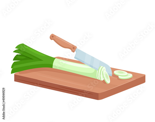 Cut leeks for cooking, isometric fresh green leeks chopped slices lie on wooden board