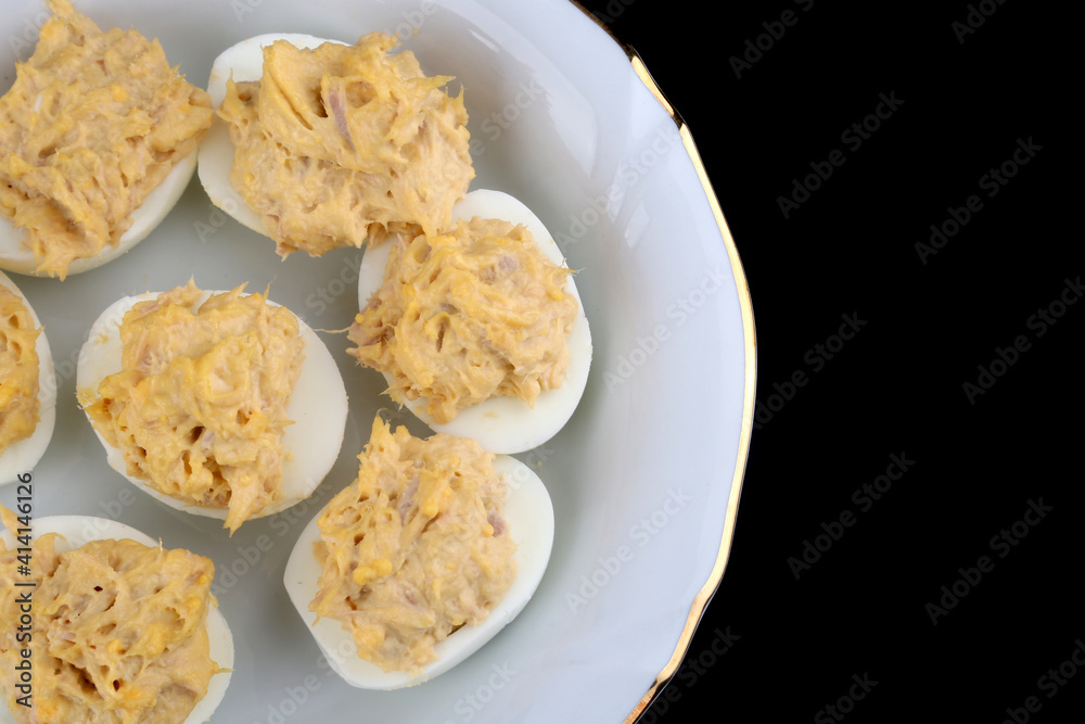 stuffed eggs with tuna and mayonnaise sauce