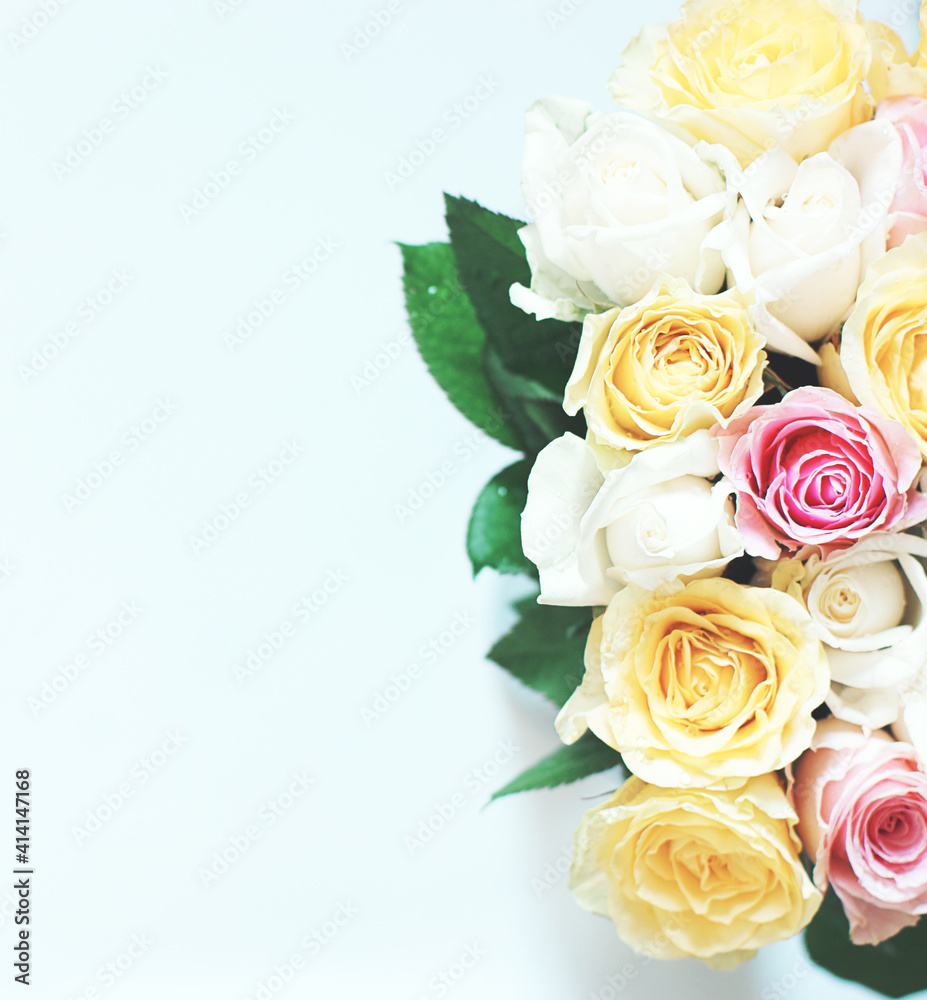 Large bouquet of many beautiful multicolored roses on a white background Large bouquet of many beautiful multicolored roses on a white background