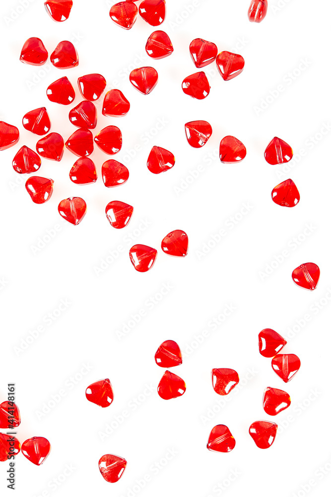 read heart-shaped beads isolated on white background