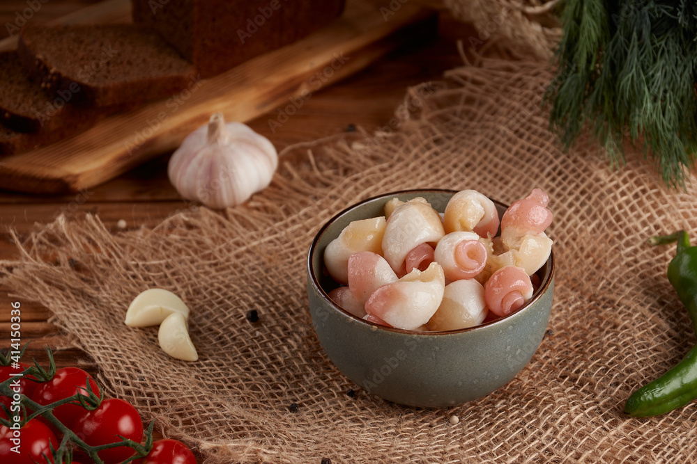 Seafood, marinated scallop in brine, wooden background