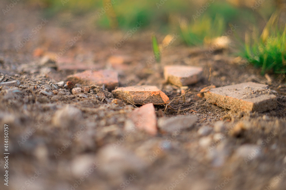 red broken stones on the ground red broken stones on the ground