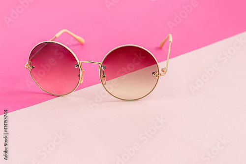 Sunglasses on a colored background. Isolate. Healthy eyes.
