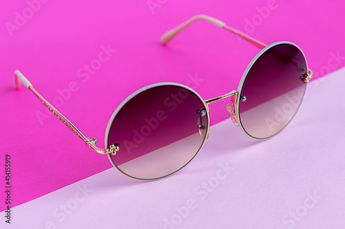 Sunglasses on a colored background. Isolate. Healthy eyes.
