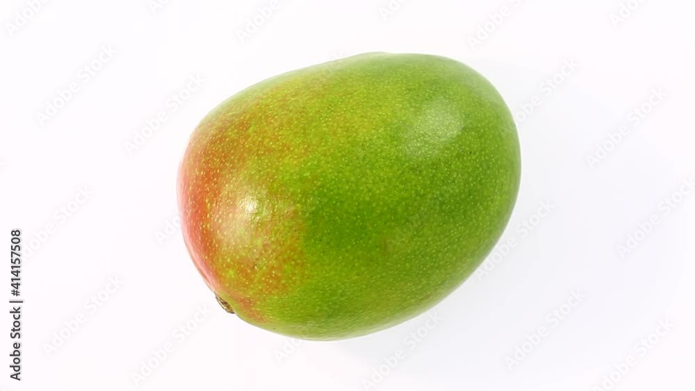 Mango whole, one, rotation, turning, top view, on white background Mango whole, one, rotation, turning, top view, on white background