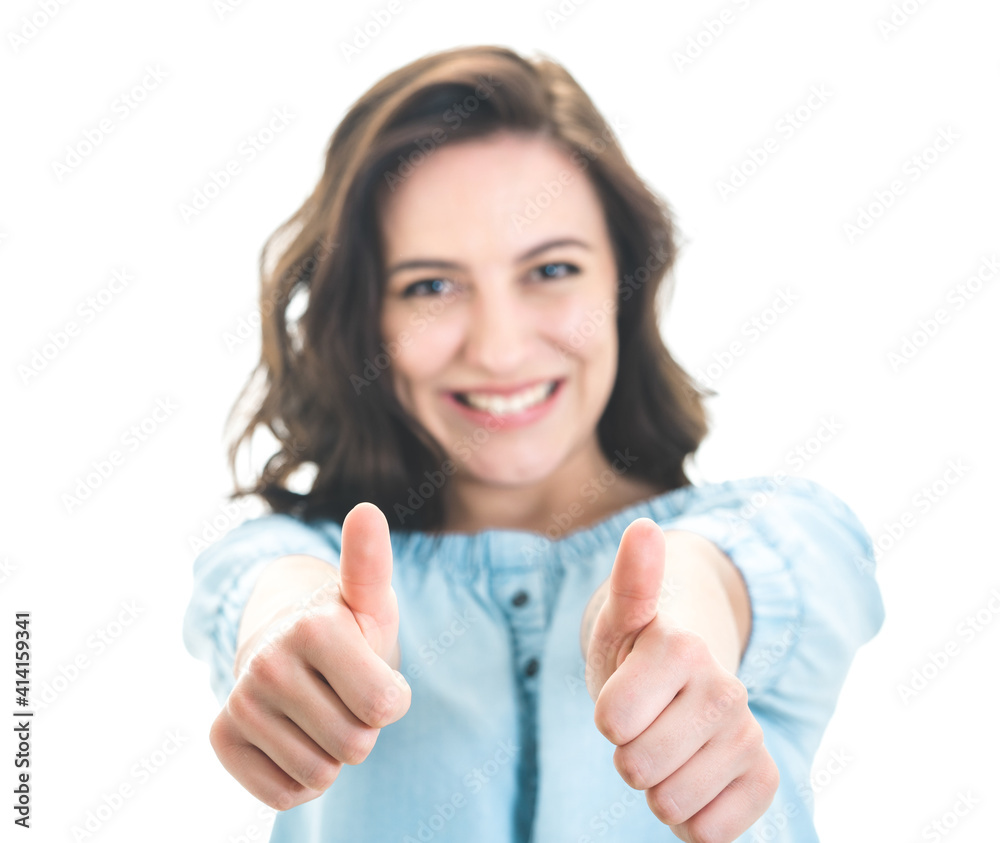 Young woman with thumbs up,like concept. Focus on thumbs, isolated on white background. Yes gesturing, sings of good work Young woman with thumbs up,like concept. Focus on thumbs, isolated on white background. Yes gesturing, sings of good work