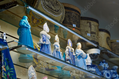 Dolls of the Snow Maiden in blue folk costumes and kokoshniks photo