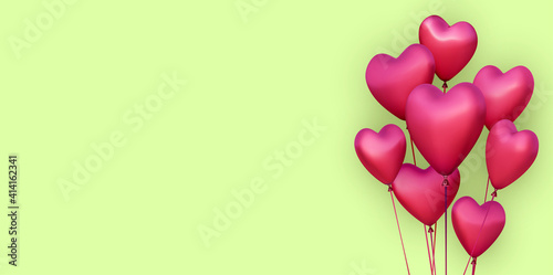 Green banner with realistic 3d pink heart balloons.