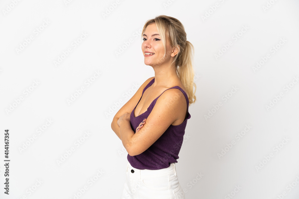 Young Russian woman isolated on white background looking to the side and smiling Young Russian woman isolated on white background looking to the side and smiling