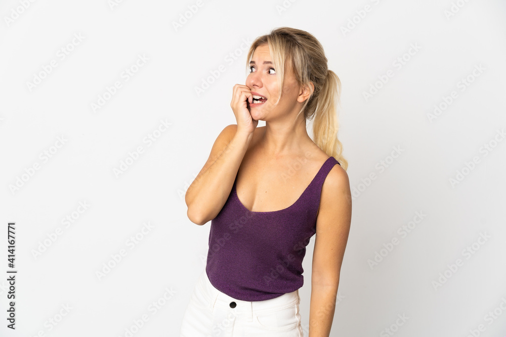 Young Russian woman isolated on white background is a little bit nervous Young Russian woman isolated on white background is a little bit nervous