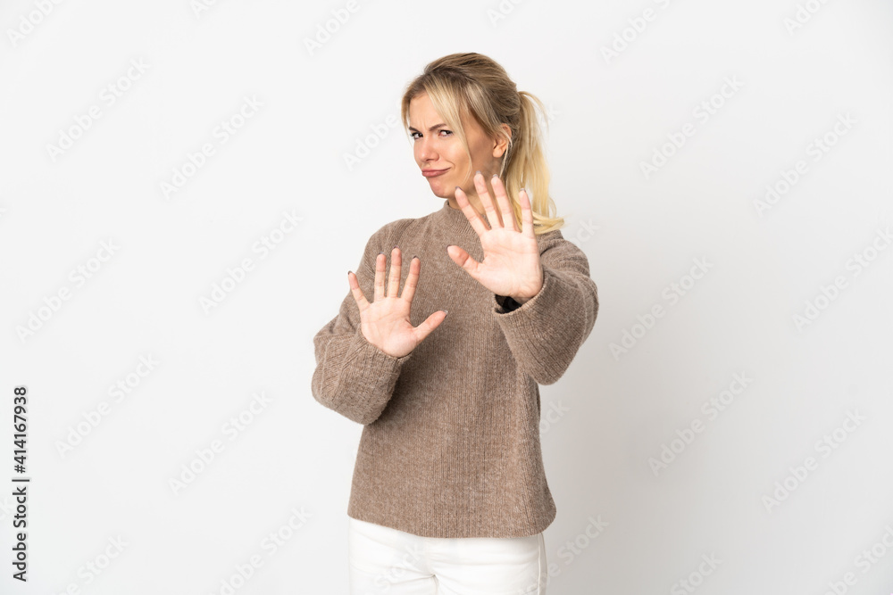 Young Russian woman isolated on white background nervous stretching hands to the front Young Russian woman isolated on white background nervous stretching hands to the front