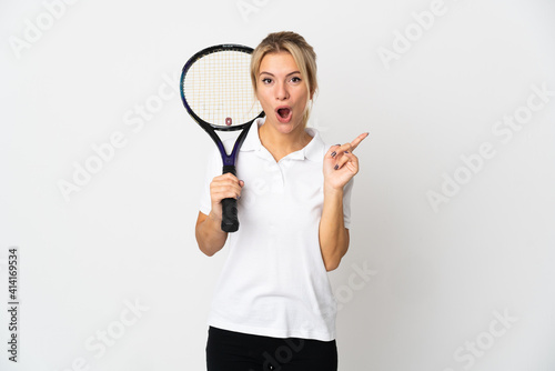 Young Russian woman tennis player isolated on white background intending to realizes the solution while lifting a finger up