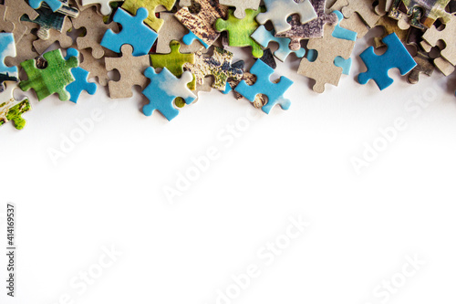 Puzzle. Background with half jigsaw puzzle and half white copy space for your text and design