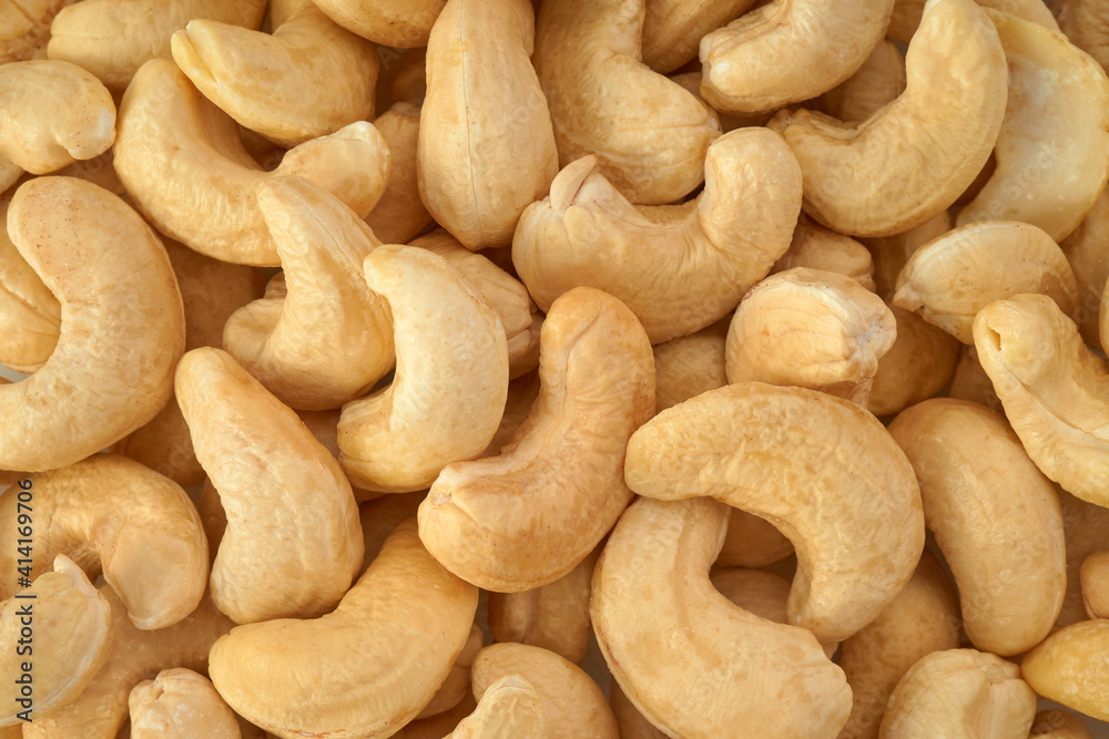 Cashew nuts closeup background, top view Cashew nuts closeup background, top view