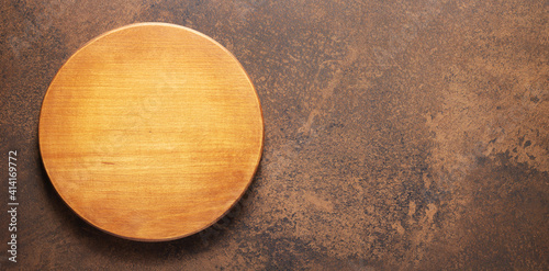 Pizza or bread cutting board for homemade baking on table. Food recipe concept at stone background texture