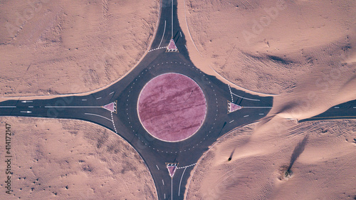 Photography Aerial top view of roads through sand dunes in Dubai, UAE