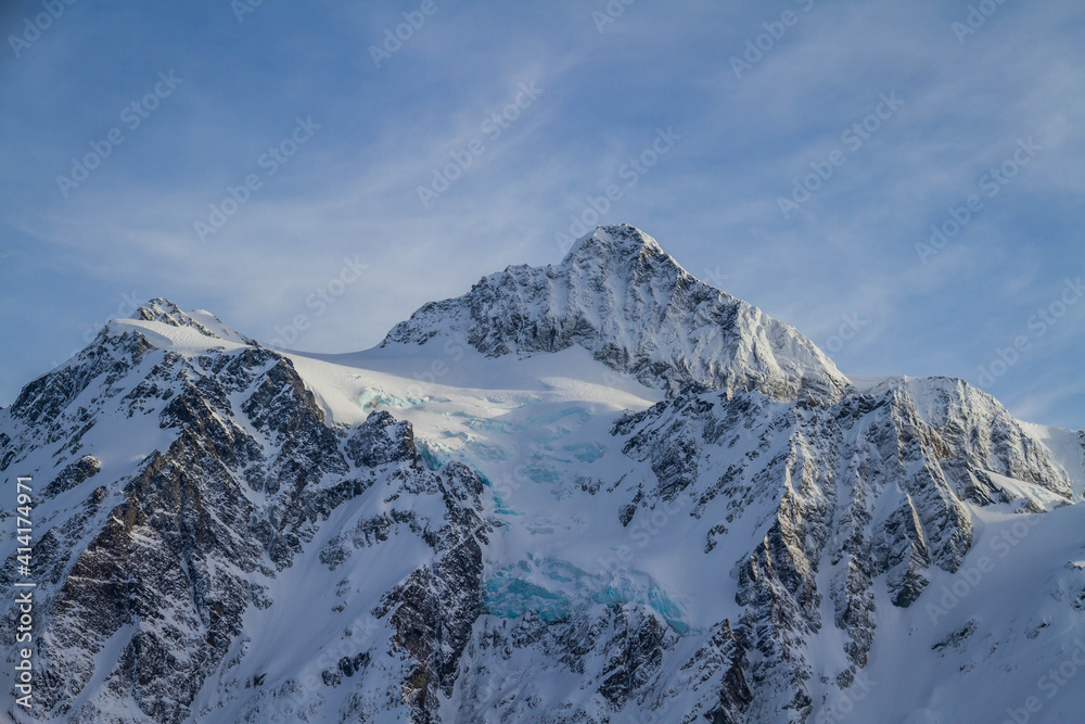 An image of Mt Shusksan in the North Cascade Mountains covered in snow.