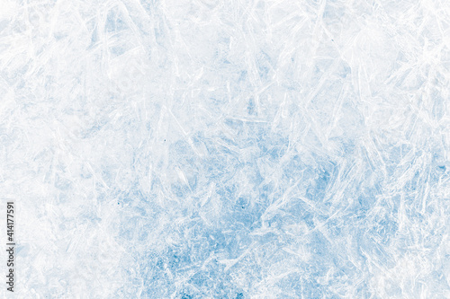 Ice texture crystal, blue tones background. Textured cold frosty surface of ice.