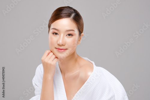Beauty asian face of the young beautiful woman skin natural make up.  close up face pretty portrait spa and salon in bathing suit. beautiful skin care cosmetic concept