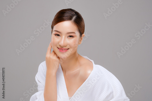 Beauty asian face of the young beautiful woman skin natural make up.  close up face pretty portrait spa and salon in bathing suit. beautiful skin care cosmetic concept
