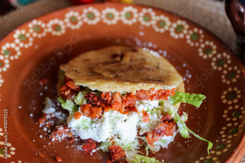 Closeup shot of Mexican food gordita de chicharron photo