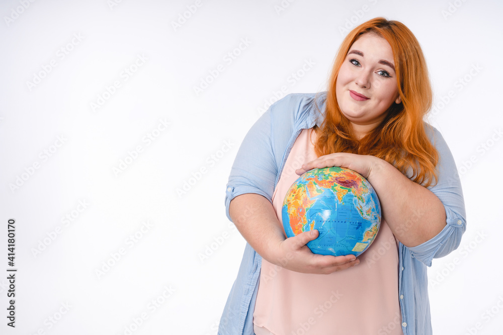 Young fat woman holding the globe with love and care , save the planet concept. Isolated over white background Young fat woman holding the globe with love and care , save the planet concept. Isolated over white background