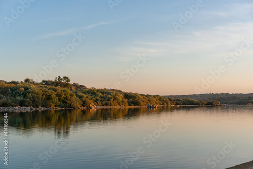 Landscape with lake reflection at sunset of Nisa Dam in Alentejo, Portugal