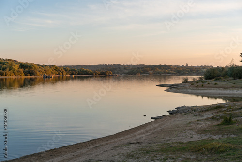 Landscape with lake reflection at sunset of Nisa Dam in Alentejo, Portugal